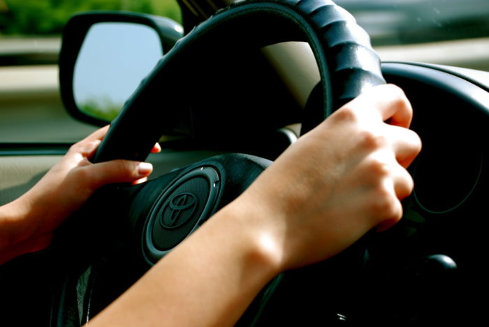 Holding a steering wheele